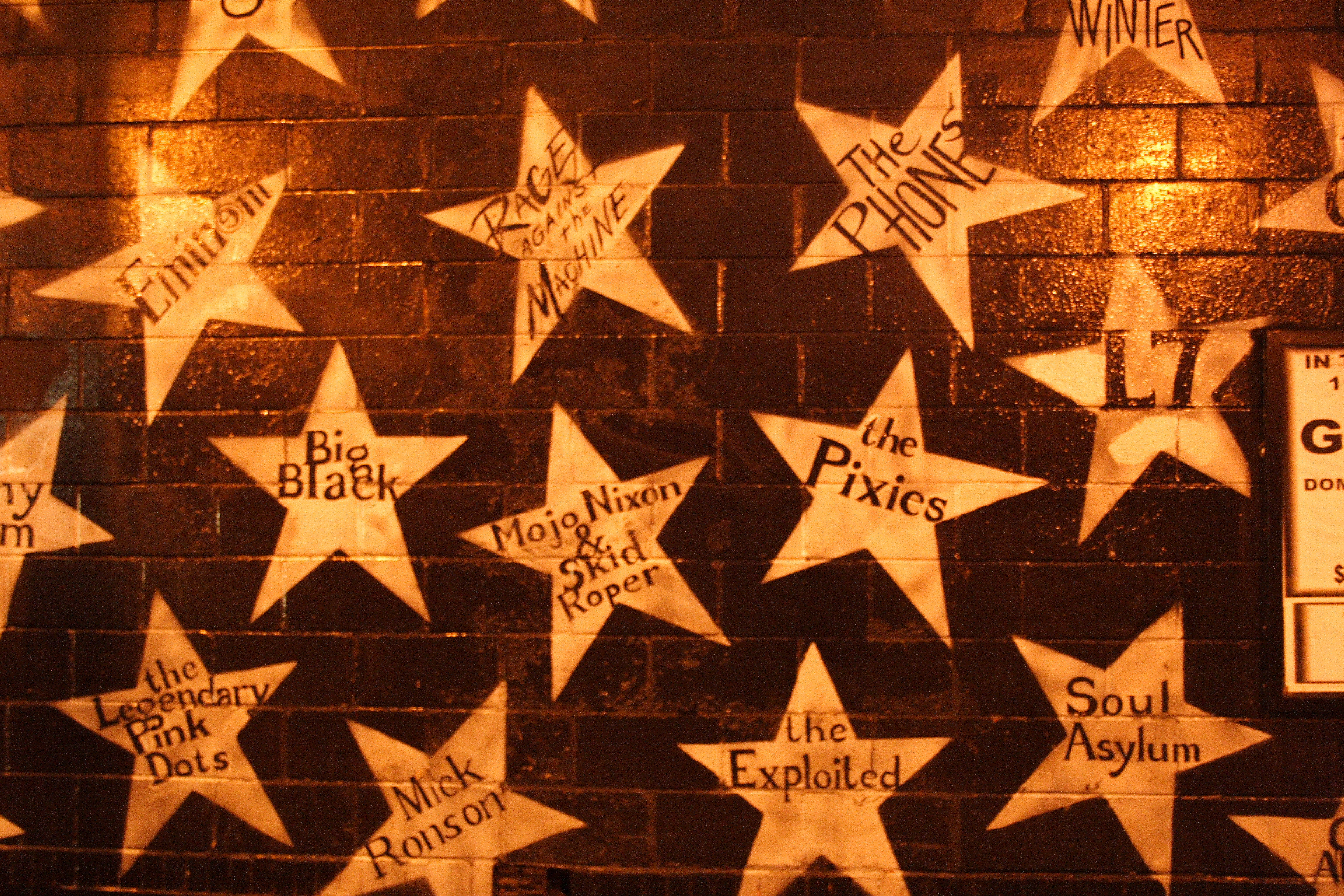 Exterior of First Avenue in Minneapolis, with painted stars naming performers on the facade